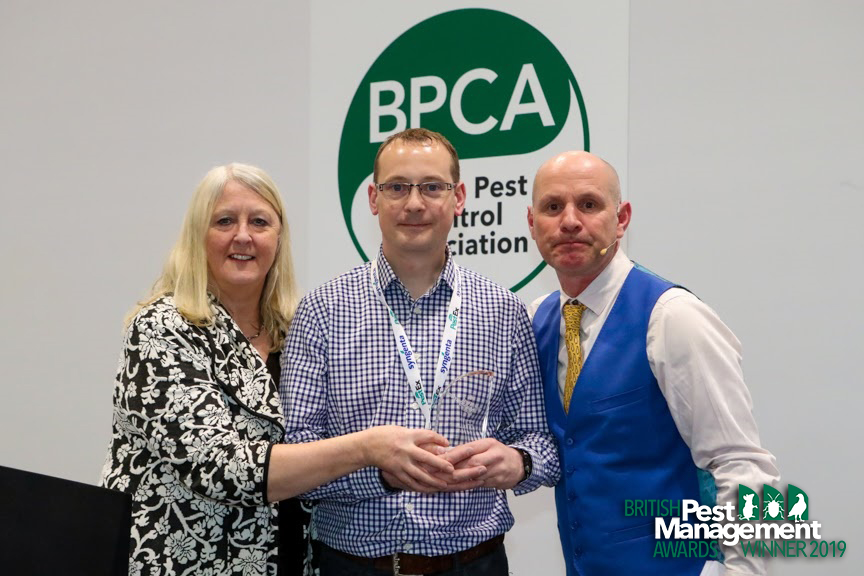 NBC Environment British Pest Management Awards Peter Goodrum of NBC Environment (centre) with Frances McKim, a member of the BPMA’s judging panel and event host, TV wildlife presenter Mike Dilger (right).